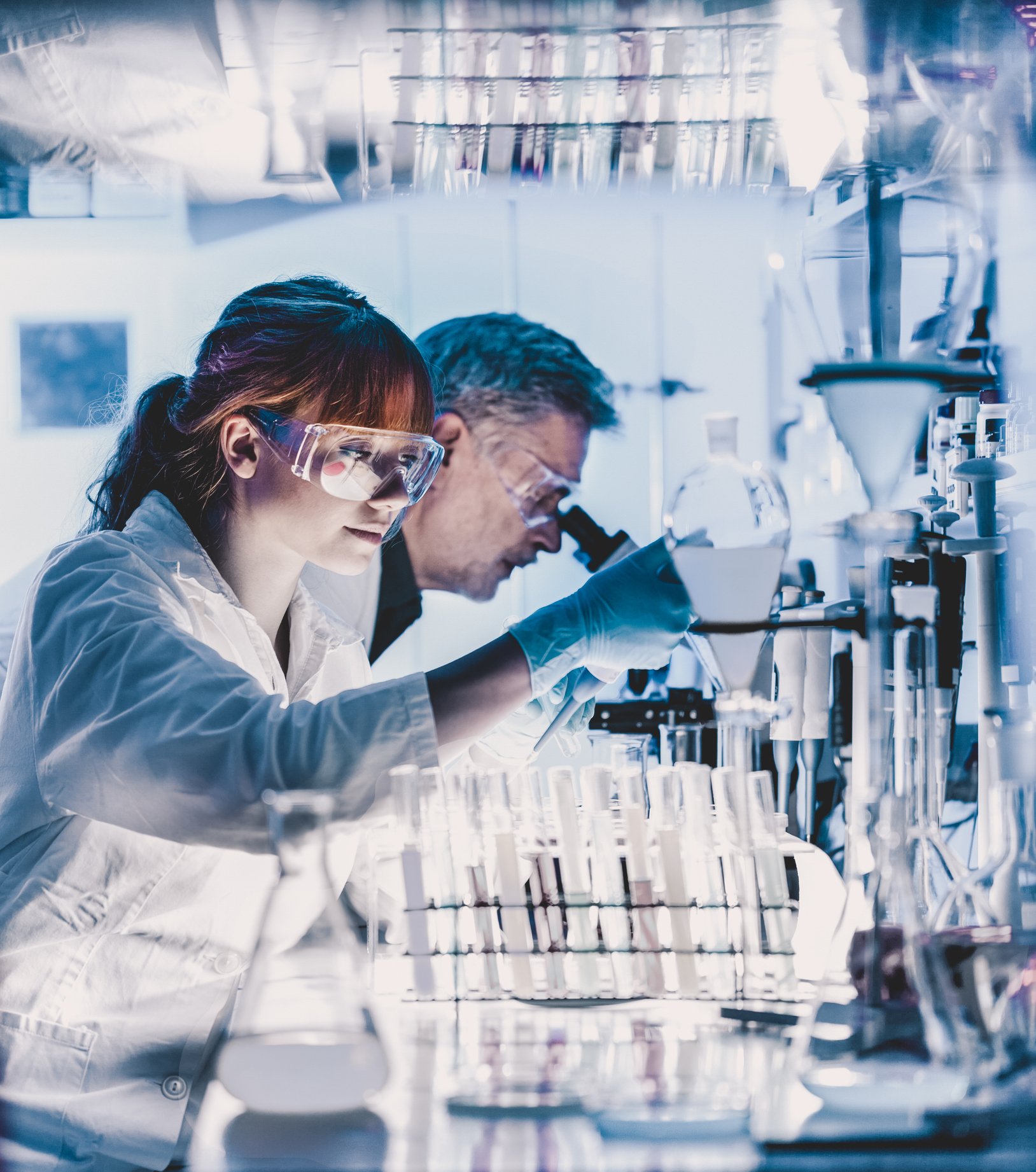 Health care researchers working in scientific laboratory.