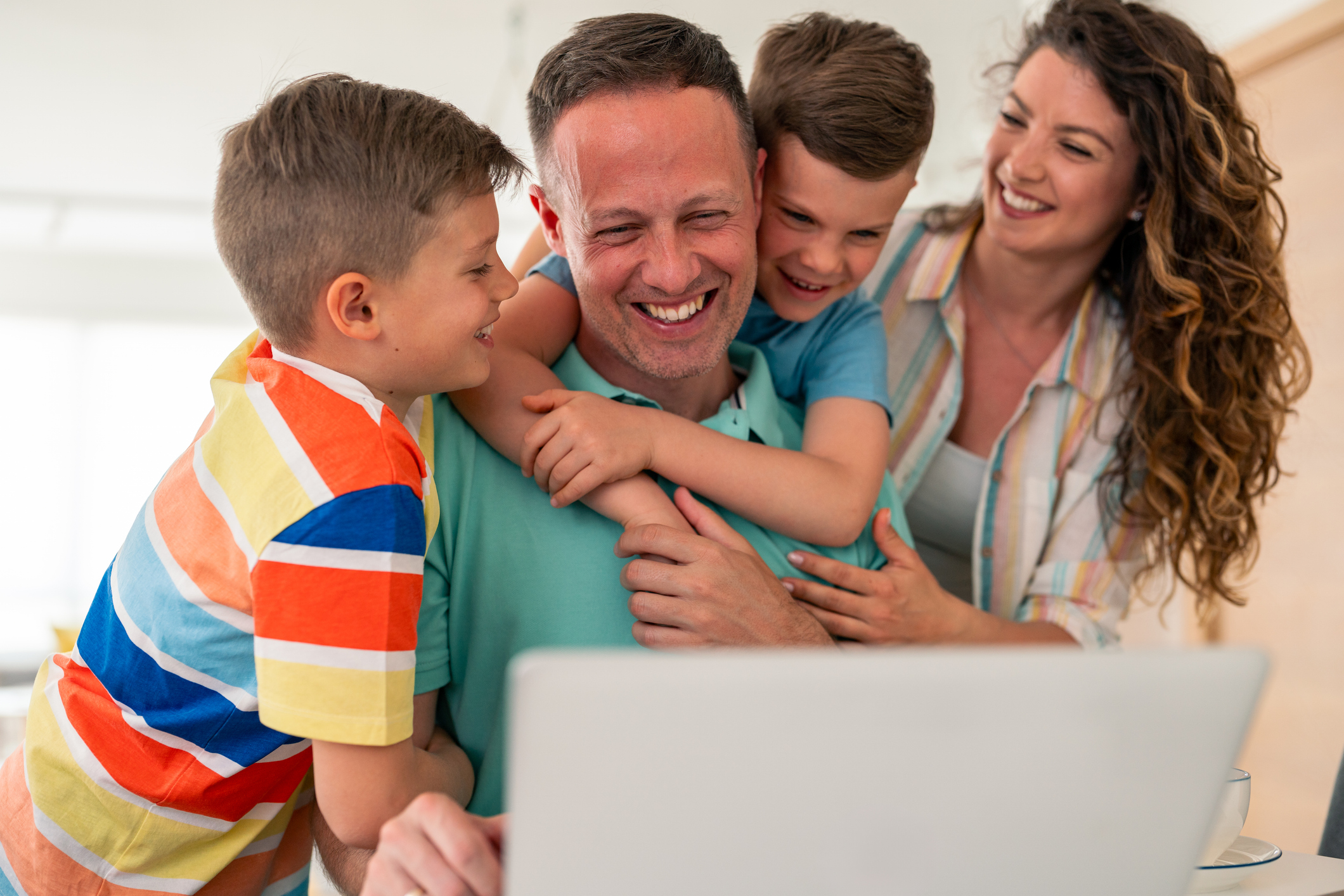 Cheerful Professional Dad Working From Home Enjoys Family Quality Time