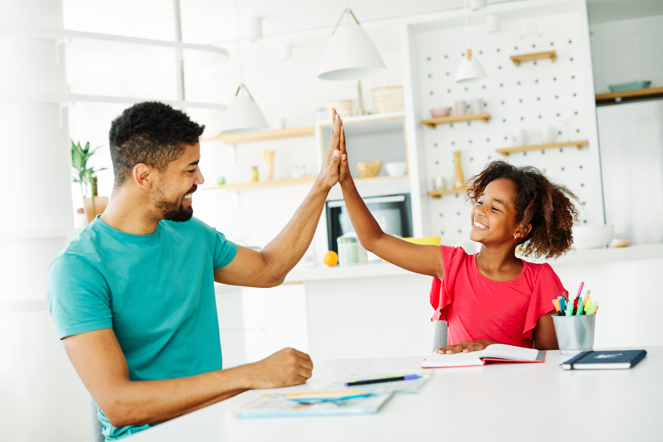 homework teaching girl high five education father children daughter familiy childhood success child